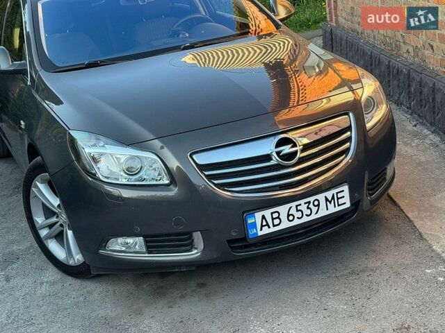 Серый Опель Инсигния, объемом двигателя 2 л и пробегом 216 тыс. км за 9500 $, фото 56 на Automoto.ua