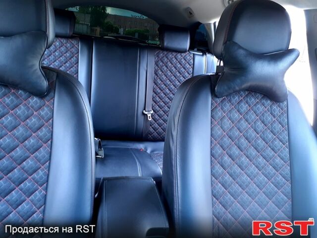 Серый Опель Инсигния, объемом двигателя 2 л и пробегом 220 тыс. км за 9850 $, фото 3 на Automoto.ua