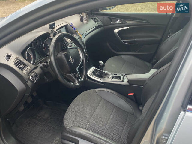 Серый Опель Инсигния, объемом двигателя 2 л и пробегом 338 тыс. км за 8100 $, фото 7 на Automoto.ua