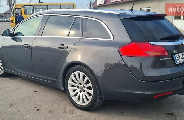 Сірий Опель Інсігнія, об'ємом двигуна 2 л та пробігом 225 тис. км за 8899 $, фото 1 на Automoto.ua