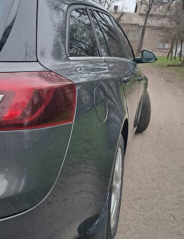 Серый Опель Инсигния, объемом двигателя 1.96 л и пробегом 292 тыс. км за 11000 $, фото 17 на Automoto.ua