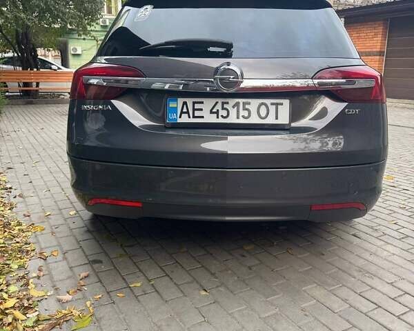 Серый Опель Инсигния, объемом двигателя 1.96 л и пробегом 205 тыс. км за 10700 $, фото 4 на Automoto.ua