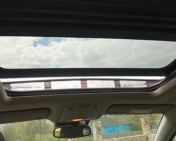 Серый Опель Инсигния, объемом двигателя 2 л и пробегом 240 тыс. км за 9500 $, фото 9 на Automoto.ua