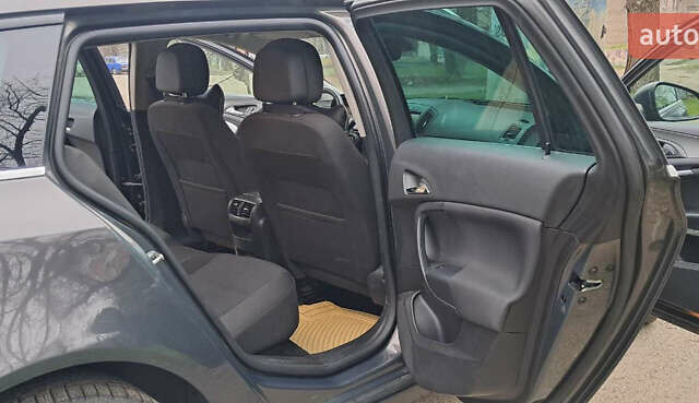 Серый Опель Инсигния, объемом двигателя 1.96 л и пробегом 292 тыс. км за 11000 $, фото 45 на Automoto.ua