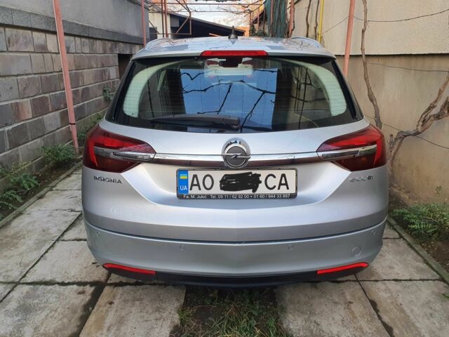 Серый Опель Инсигния, объемом двигателя 2 л и пробегом 300 тыс. км за 8800 $, фото 4 на Automoto.ua