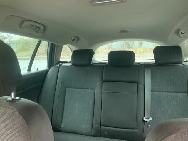 Сірий Опель Інсігнія, об'ємом двигуна 2 л та пробігом 322 тис. км за 9000 $, фото 5 на Automoto.ua