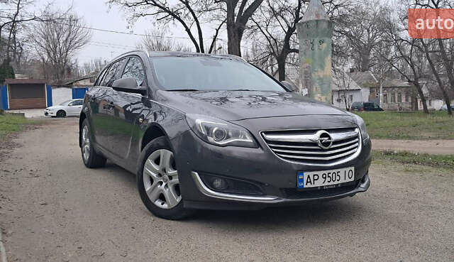 Серый Опель Инсигния, объемом двигателя 1.96 л и пробегом 292 тыс. км за 11000 $, фото 5 на Automoto.ua