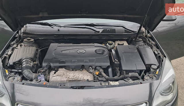 Серый Опель Инсигния, объемом двигателя 1.96 л и пробегом 292 тыс. км за 11000 $, фото 48 на Automoto.ua