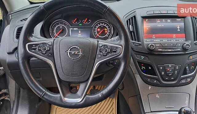 Серый Опель Инсигния, объемом двигателя 1.96 л и пробегом 292 тыс. км за 11000 $, фото 58 на Automoto.ua