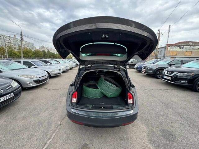 Сірий Опель Інсігнія, об'ємом двигуна 2 л та пробігом 245 тис. км за 8499 $, фото 4 на Automoto.ua