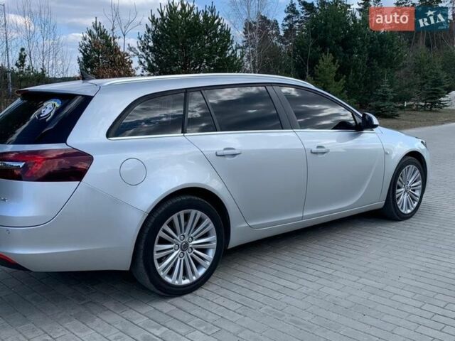Серый Опель Инсигния, объемом двигателя 2 л и пробегом 224 тыс. км за 9400 $, фото 14 на Automoto.ua