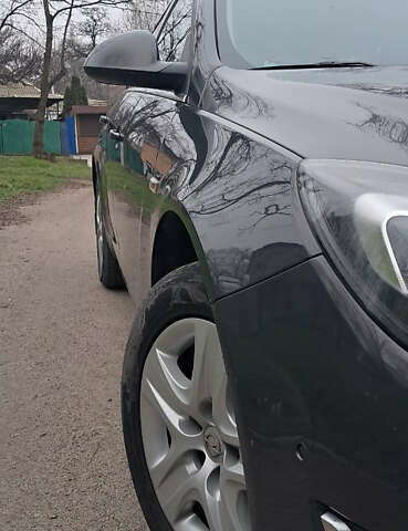 Серый Опель Инсигния, объемом двигателя 1.96 л и пробегом 292 тыс. км за 11000 $, фото 16 на Automoto.ua