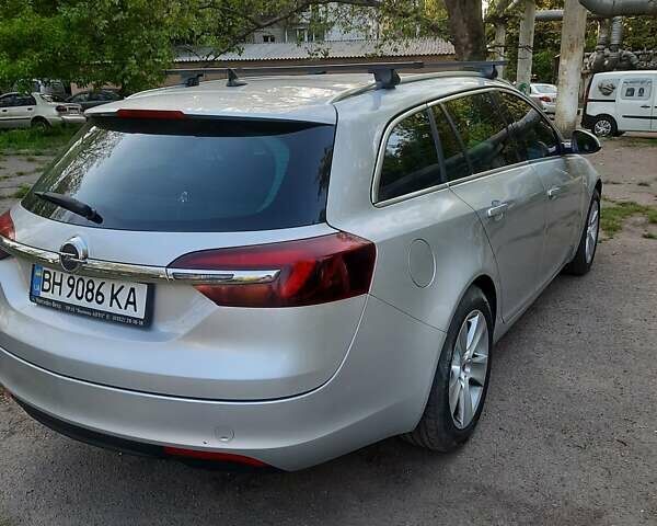 Серый Опель Инсигния, объемом двигателя 2 л и пробегом 270 тыс. км за 10499 $, фото 2 на Automoto.ua