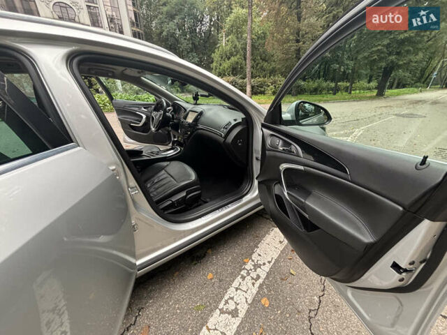 Сірий Опель Інсігнія, об'ємом двигуна 1.96 л та пробігом 253 тис. км за 10999 $, фото 16 на Automoto.ua