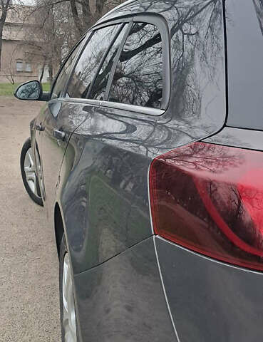 Серый Опель Инсигния, объемом двигателя 1.96 л и пробегом 292 тыс. км за 11000 $, фото 19 на Automoto.ua