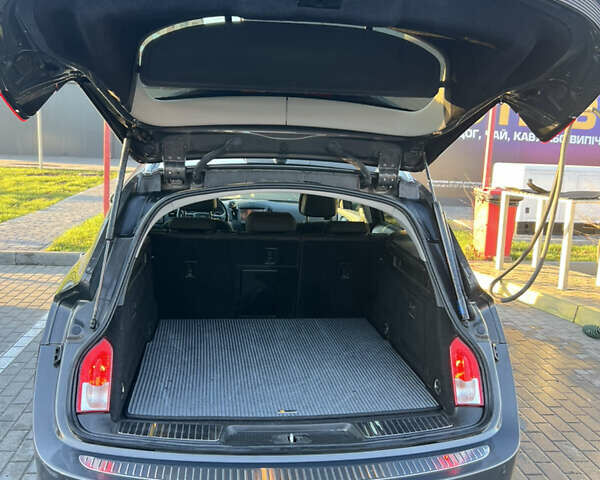 Серый Опель Инсигния, объемом двигателя 2 л и пробегом 248 тыс. км за 9750 $, фото 6 на Automoto.ua