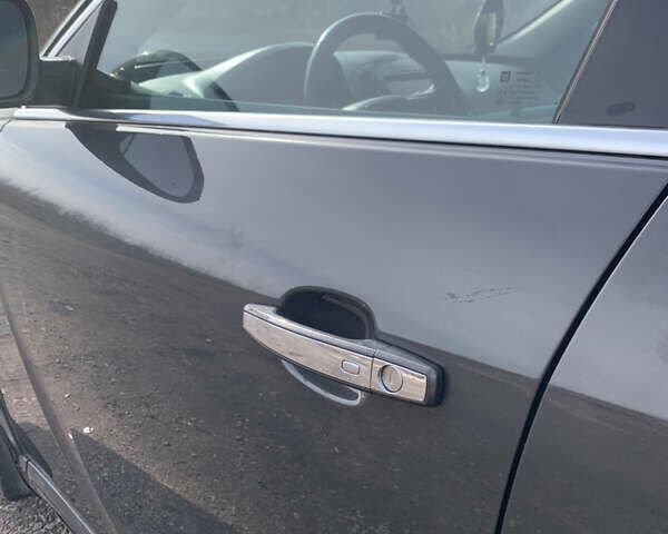 Серый Опель Инсигния, объемом двигателя 2 л и пробегом 263 тыс. км за 11000 $, фото 5 на Automoto.ua