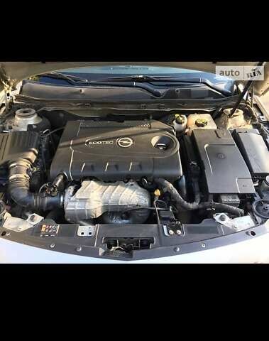 Серый Опель Инсигния, объемом двигателя 2 л и пробегом 313 тыс. км за 10300 $, фото 6 на Automoto.ua