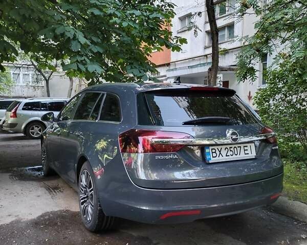 Серый Опель Инсигния, объемом двигателя 1.96 л и пробегом 198 тыс. км за 11980 $, фото 5 на Automoto.ua