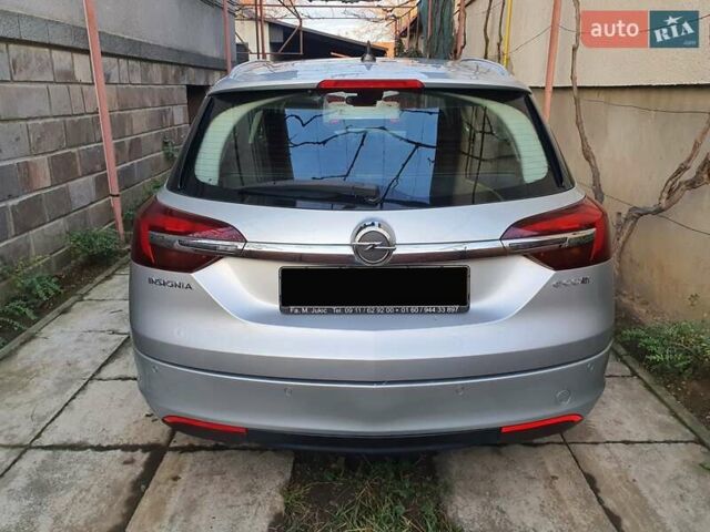 Сірий Опель Інсігнія, об'ємом двигуна 1.96 л та пробігом 300 тис. км за 9000 $, фото 4 на Automoto.ua