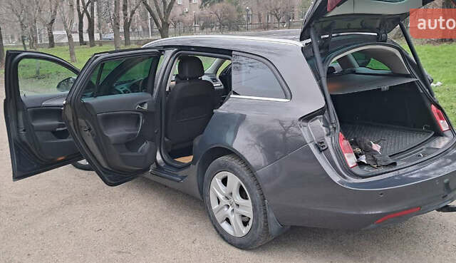 Серый Опель Инсигния, объемом двигателя 1.96 л и пробегом 292 тыс. км за 11000 $, фото 52 на Automoto.ua