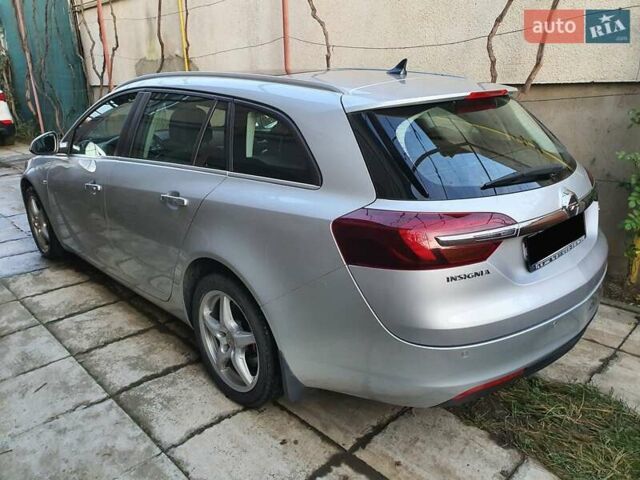 Сірий Опель Інсігнія, об'ємом двигуна 1.96 л та пробігом 300 тис. км за 9000 $, фото 5 на Automoto.ua