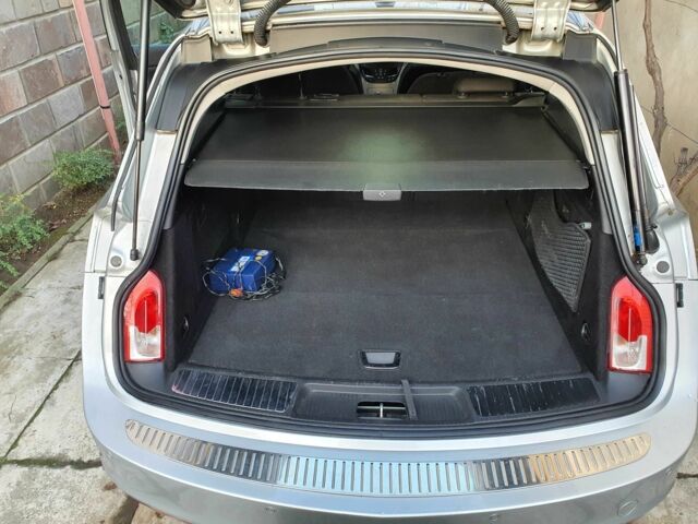 Серый Опель Инсигния, объемом двигателя 2 л и пробегом 300 тыс. км за 8800 $, фото 6 на Automoto.ua