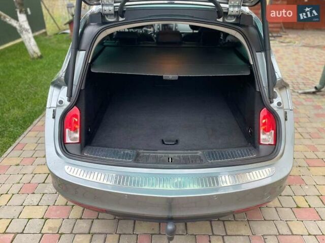 Сірий Опель Інсігнія, об'ємом двигуна 1.96 л та пробігом 247 тис. км за 9800 $, фото 3 на Automoto.ua