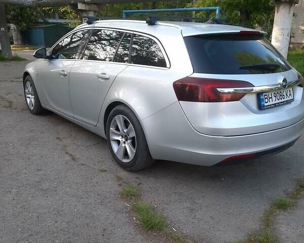 Серый Опель Инсигния, объемом двигателя 2 л и пробегом 270 тыс. км за 10499 $, фото 3 на Automoto.ua