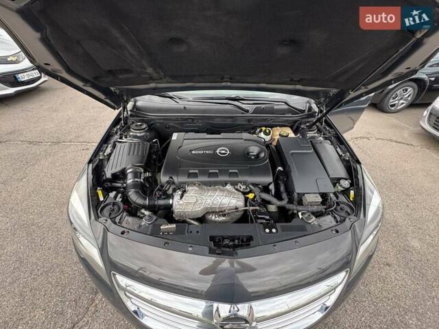 Сірий Опель Інсігнія, об'ємом двигуна 1.96 л та пробігом 245 тис. км за 8499 $, фото 4 на Automoto.ua