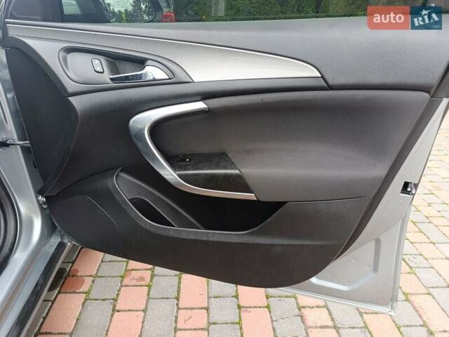 Серый Опель Инсигния, объемом двигателя 2 л и пробегом 259 тыс. км за 9799 $, фото 5 на Automoto.ua