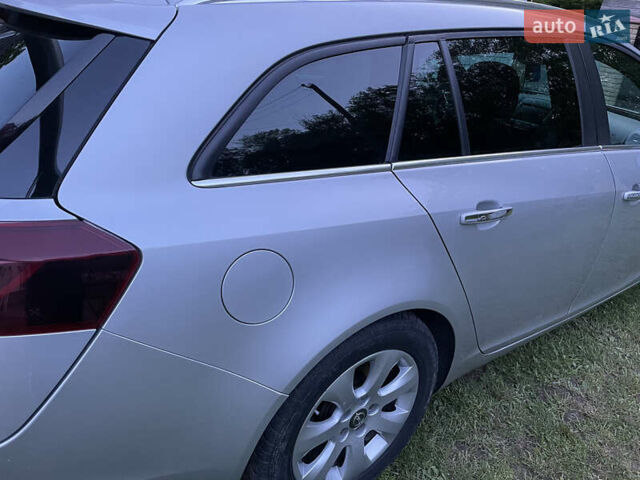 Серый Опель Инсигния, объемом двигателя 1.96 л и пробегом 212 тыс. км за 11999 $, фото 2 на Automoto.ua