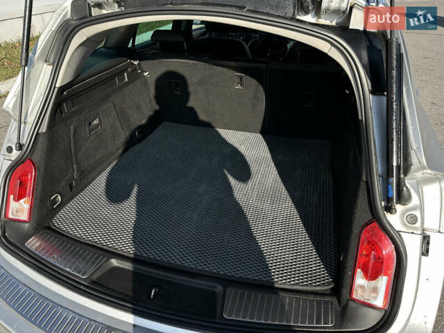 Сірий Опель Інсігнія, об'ємом двигуна 1.6 л та пробігом 249 тис. км за 9800 $, фото 10 на Automoto.ua