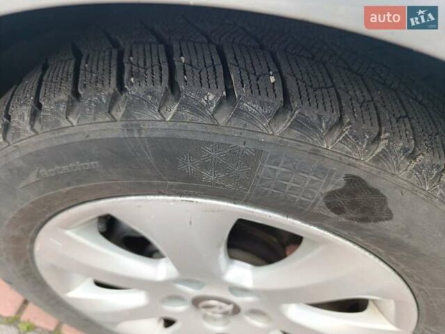 Серый Опель Инсигния, объемом двигателя 2 л и пробегом 259 тыс. км за 9799 $, фото 2 на Automoto.ua