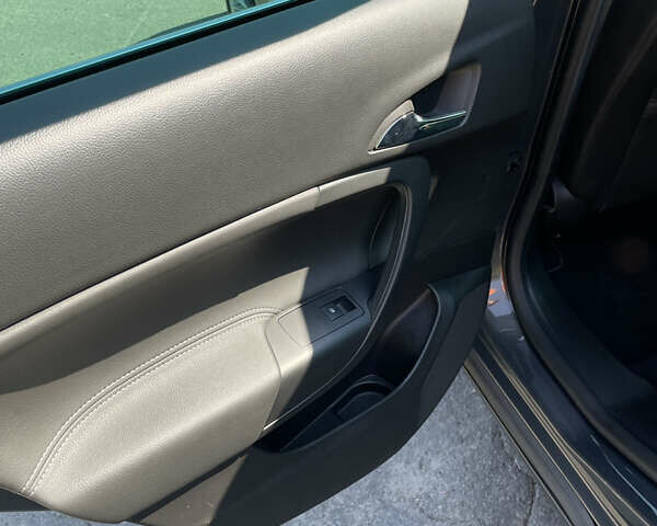 Сірий Опель Інсігнія, об'ємом двигуна 1.96 л та пробігом 297 тис. км за 11000 $, фото 101 на Automoto.ua