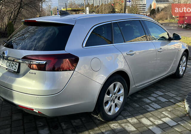 Серый Опель Инсигния, объемом двигателя 1.6 л и пробегом 249 тыс. км за 9500 $, фото 6 на Automoto.ua