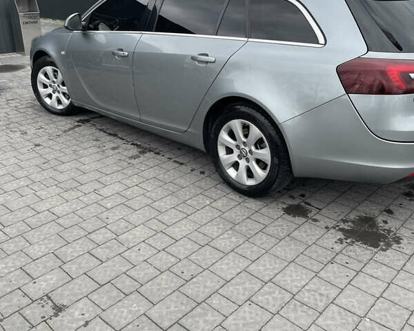 Серый Опель Инсигния, объемом двигателя 1.96 л и пробегом 290 тыс. км за 12500 $, фото 3 на Automoto.ua