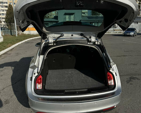 Сірий Опель Інсігнія, об'ємом двигуна 1.6 л та пробігом 249 тис. км за 9800 $, фото 9 на Automoto.ua