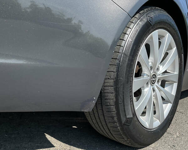 Сірий Опель Інсігнія, об'ємом двигуна 1.96 л та пробігом 297 тис. км за 11000 $, фото 158 на Automoto.ua