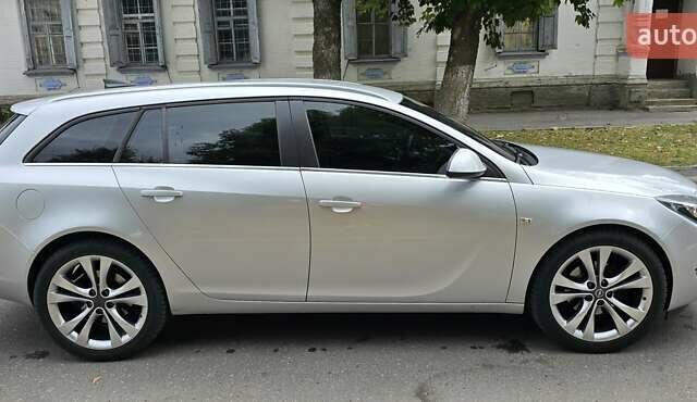 Сірий Опель Інсігнія, об'ємом двигуна 1.96 л та пробігом 249 тис. км за 13100 $, фото 1 на Automoto.ua