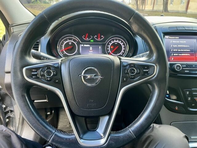 Серый Опель Инсигния, объемом двигателя 1.6 л и пробегом 238 тыс. км за 9700 $, фото 5 на Automoto.ua