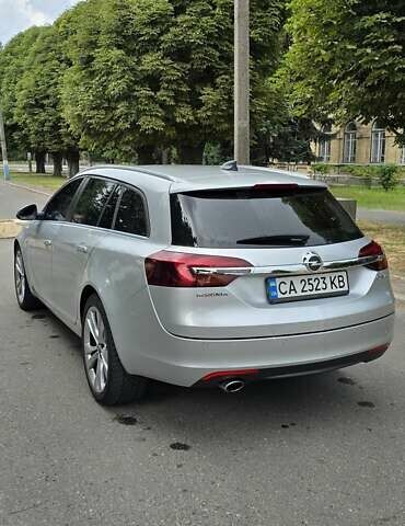Сірий Опель Інсігнія, об'ємом двигуна 1.96 л та пробігом 249 тис. км за 13100 $, фото 7 на Automoto.ua