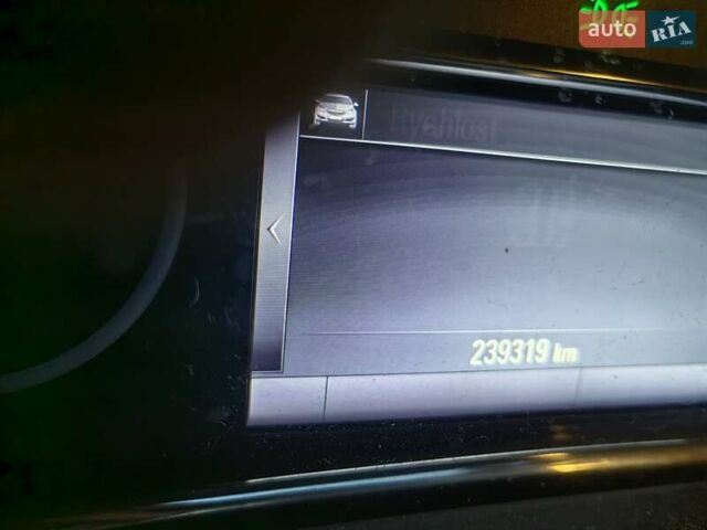 Серый Опель Инсигния, объемом двигателя 1.96 л и пробегом 239 тыс. км за 10000 $, фото 4 на Automoto.ua