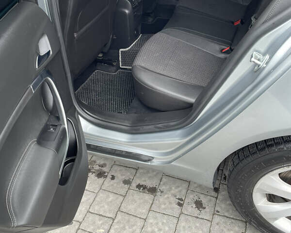 Сірий Опель Інсігнія, об'ємом двигуна 1.96 л та пробігом 290 тис. км за 12500 $, фото 10 на Automoto.ua