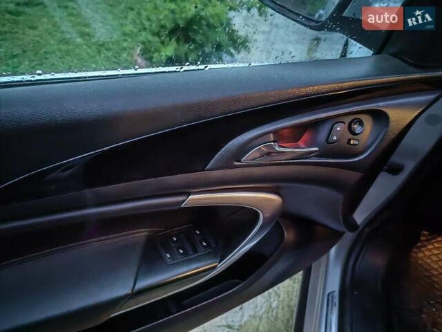 Сірий Опель Інсігнія, об'ємом двигуна 1.96 л та пробігом 239 тис. км за 10000 $, фото 11 на Automoto.ua