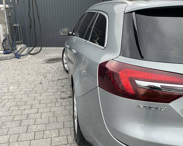 Серый Опель Инсигния, объемом двигателя 1.96 л и пробегом 290 тыс. км за 12500 $, фото 5 на Automoto.ua