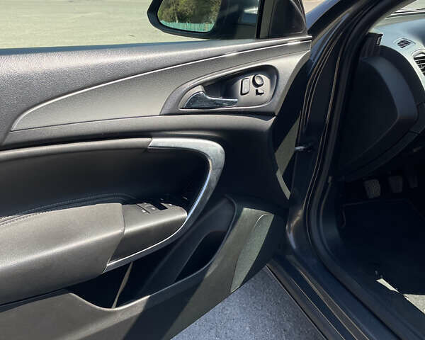 Сірий Опель Інсігнія, об'ємом двигуна 1.96 л та пробігом 297 тис. км за 11000 $, фото 85 на Automoto.ua