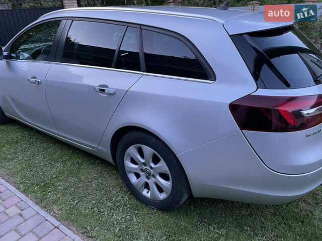 Сірий Опель Інсігнія, об'ємом двигуна 1.96 л та пробігом 212 тис. км за 11499 $, фото 1 на Automoto.ua