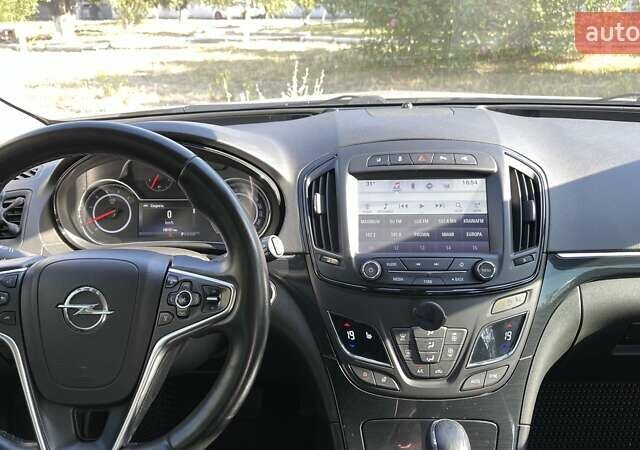 Сірий Опель Інсігнія, об'ємом двигуна 1.6 л та пробігом 198 тис. км за 11250 $, фото 13 на Automoto.ua