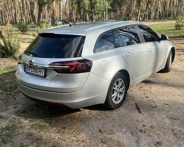 Серый Опель Инсигния, объемом двигателя 1.6 л и пробегом 224 тыс. км за 11500 $, фото 4 на Automoto.ua